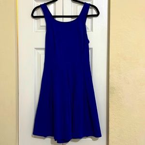Express skater style dress with a crossover/open back style.